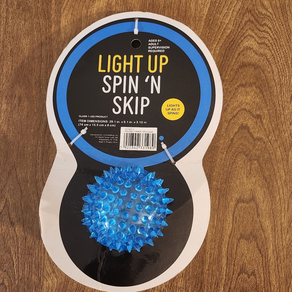 NWT Light Up Spin 'N Skip